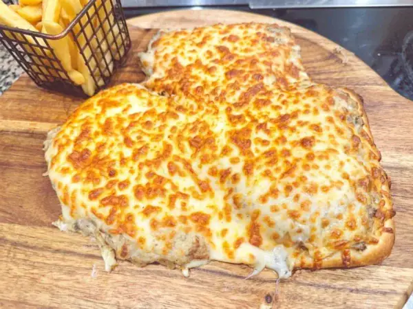 Parmigiana with Chips at Cheezious Fawkner